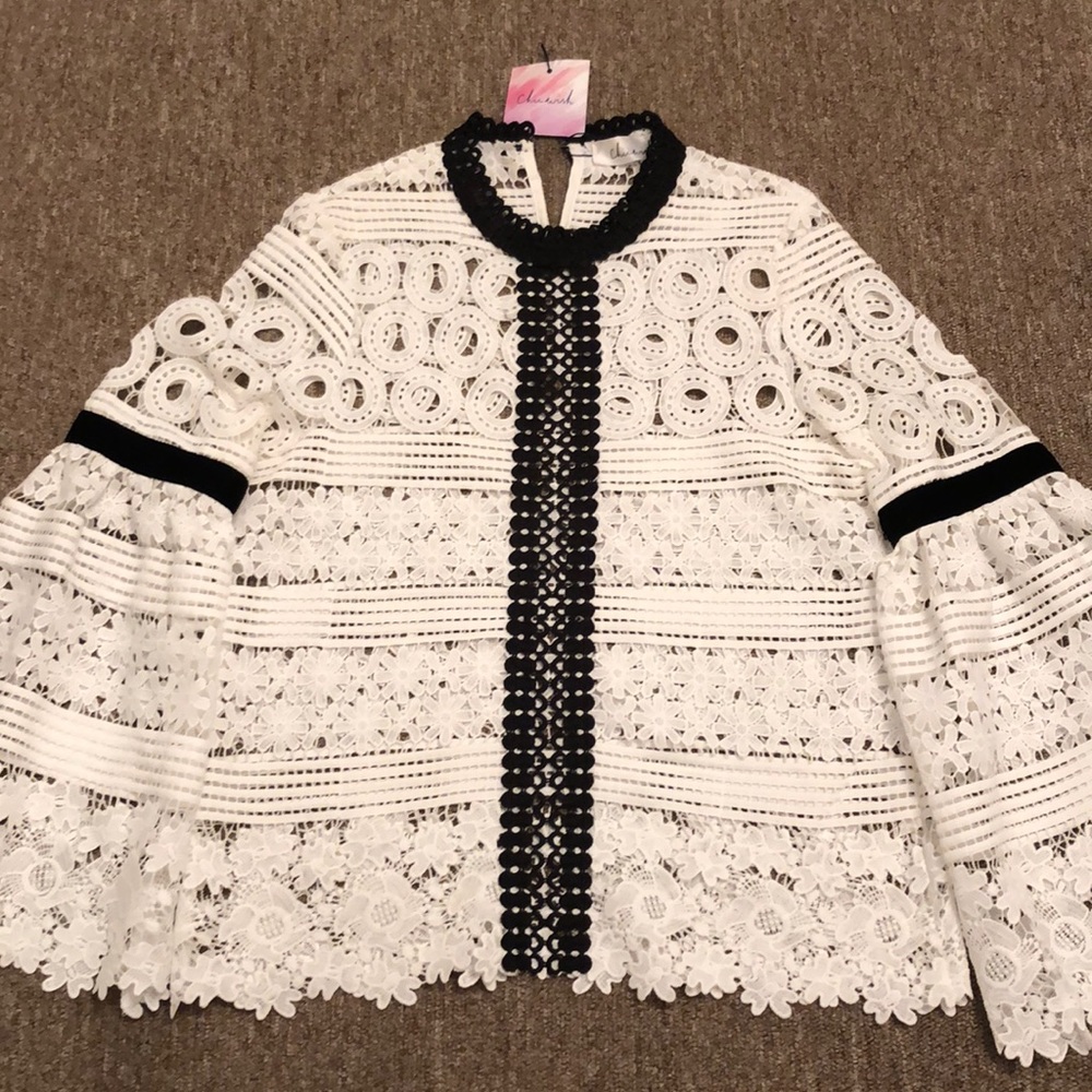 Blouse black and white lace.